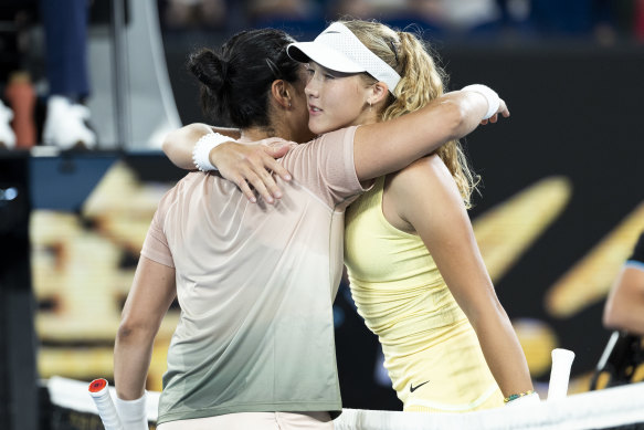 Ons Jabeur embraces winner Andreeva after their match.