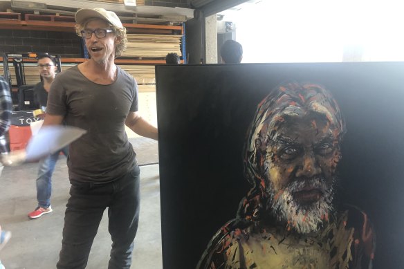 Artist Craig Ruddy dropping off his third portrait of David Gulpilil into the Archibald Prize in 2021.