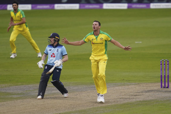 Australia's Josh Hazlewood, right, reacts after bowling a delivery to England's Jonny Bairstow during the first ODI cricket match between England and Australia.