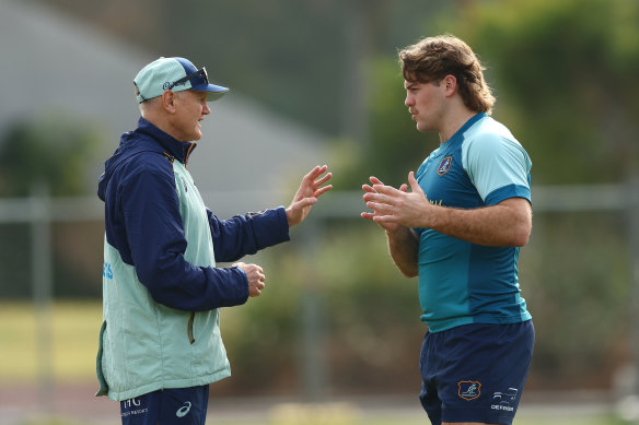 Coach Joe Schmidt and Fraser McReight talk during a Wallabies training session in Brisbane.