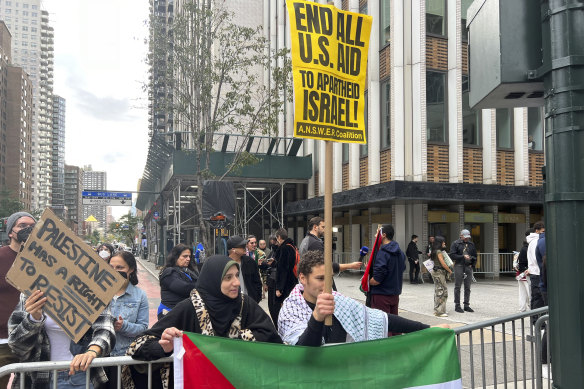 Pro-Palestinian protesters assemble on 42nd Street in New York City on Sunday, US time. 