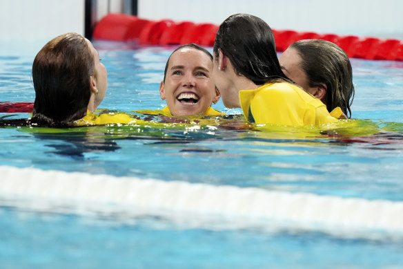Australia’s 4x100m medley relay silver medal winners Kaylee McKeown, Jenna Strauch, Emma McKeon and Mollie O’Callaghan celebrate after the awards ceremony.
