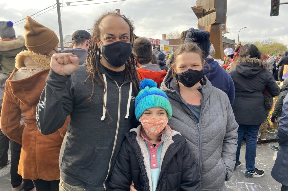 Minneapolis man Jud Kilgore with wife Katrina and daughter Luna in George Floyd Square.