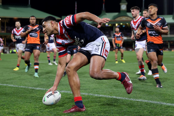 Daniel Tupou gets in on the act as the Roosters pile on the points.