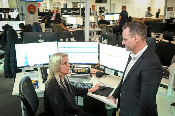 Jetstar chief operating officer Matthew Franzi and Jetstar operations control centre manager Lois May.