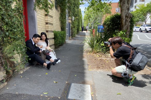 A Japanese couple have their pre-wedding photographs taken at previously rundown Teneriffe near Vernon Terrace.