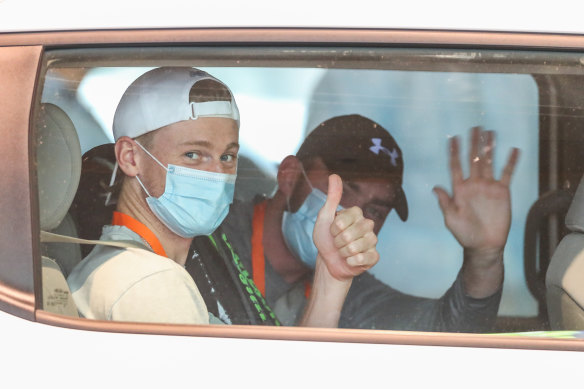 Australian tennis player Blake Mott in a players transport van from the Grand Hyatt to practise for the Australian Open.