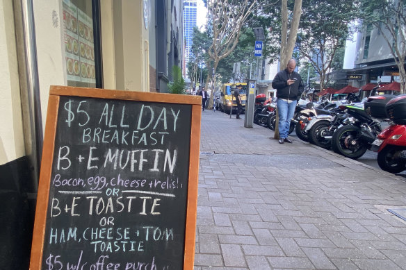 In Brisbane’s Charlotte Street, the hole in the wall Henry’s Coffee Bar is offering $5 all-day brekkies to attract customers.