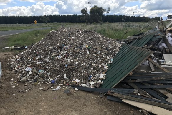 One of many examples of contaminated soil in Hume. The green fence could be used to trace its origin.