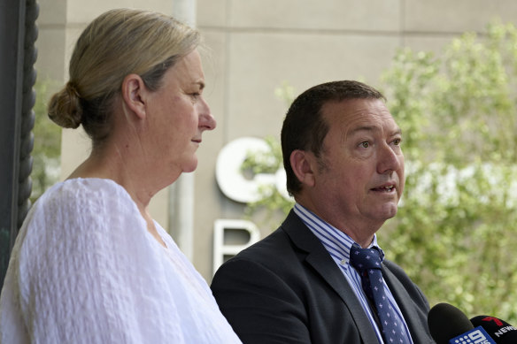 Stewart Little and Nicole Jess from the Public Service Association speak outside court.