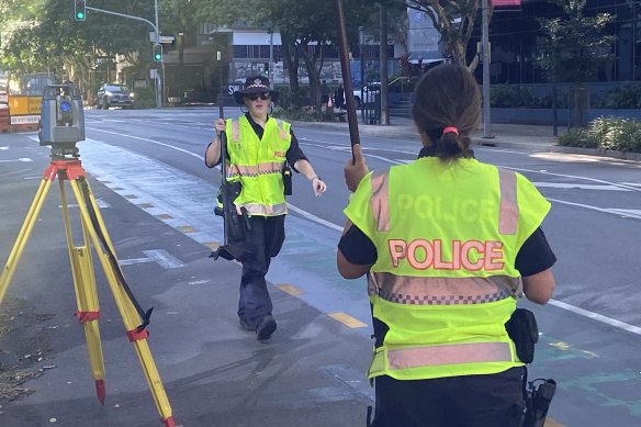 The Forensic Crash Unit investigates the site.