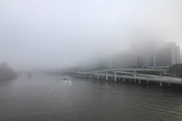 Brisbane was hiding behind thick fog on Wednesday morning.