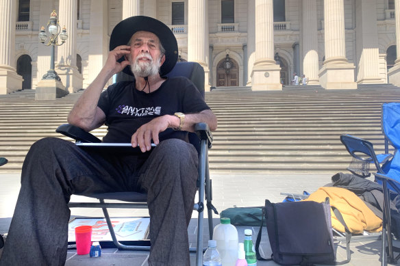 Retired English teacher Dave McKay, 75, sat in front of Victorian Parliament for 38 days while sleeping in a campervan at night. 
