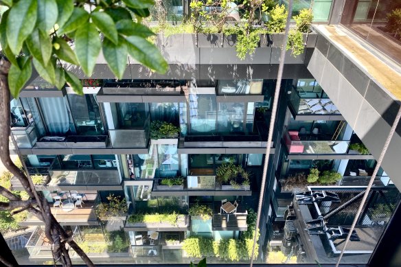 Looking down from the sky-deck, where penthouse-residents can relax with bubbles in an outdoor spa, to the magical array of gardens and balconies of One Central Park 


