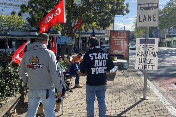 The Roma Street CFMEU picket line on Wednesday. The first train to go underground in Brisbane has been delayed because of ‘interruptions to work schedules’, Cross River Rail’s lead contractor CPB says.