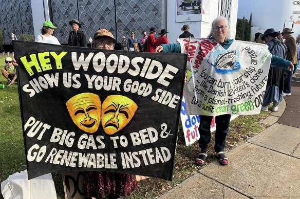 Protesters outside the Woodside AGM at Crown Perth. 