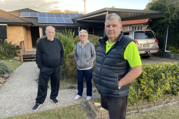 Yeronga’s Orient Street residents (from left) John and Lynette Daley, and co-ordinator Peter Paulsen (front), say Brisbane City Council has still not remedied a blocked creek they first complained about before the 2011 floods.