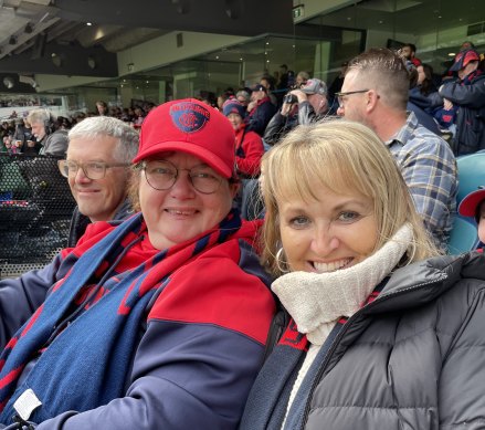 Demons fans Angus Gordon, Katrina Oxley and Jo Abbott at the MCG.