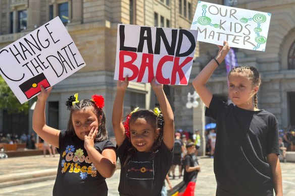 Protesters rally against Invasion Day in Perth this afternoon. 