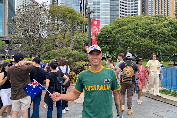 Jason Lopez celebrates by Sydney Harbour.