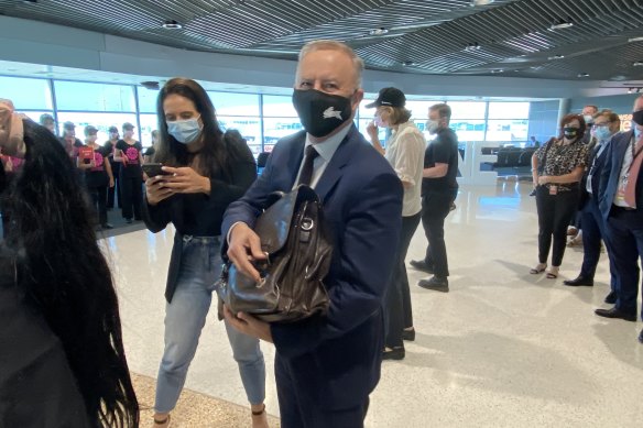 Opposition Leader Anthony Albanese was on Qantas Flight 504 from Sydney to Brisbane, the first domestic flight to arrive in Brisbane after borders opened. 