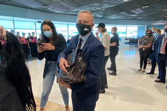 Opposition Leader Anthony Albanese was on Qantas Flight 504 from Sydney to Brisbane, the first domestic flight to arrive in Brisbane after borders opened. 