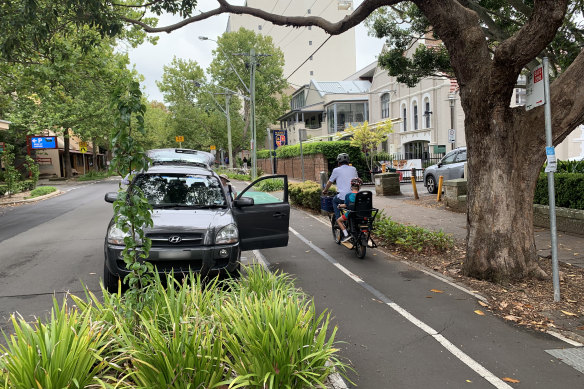A bike path built on Ridge Street in North Sydney is typical of the dangerous design of bike lanes that puts cyclists at risk from car doors swinging into their path. 