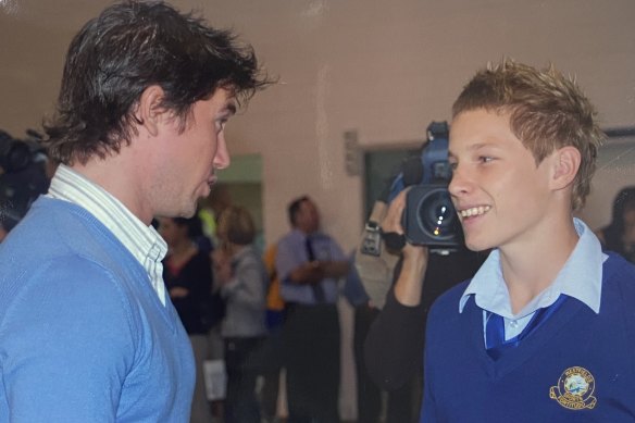 Harry Kewell visiting Westfield Sports High, speaking with future Socceroo Aaron Mooy.