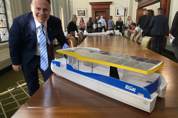 Lord Mayor Adrian Schrinner with a model of the EVCat proposed in 2023. 
