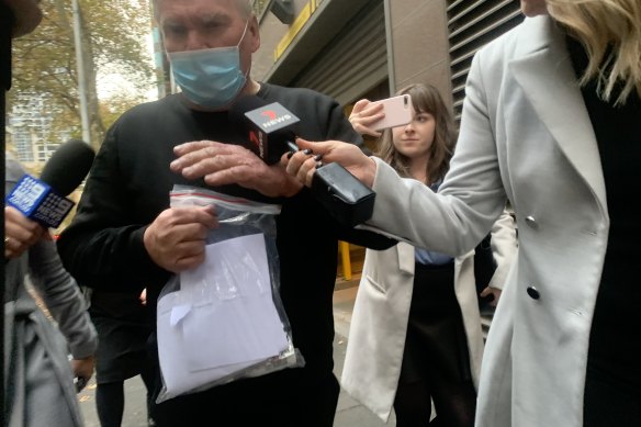 Frank Rogers leaving the Melbourne Magistrates Court on Saturday.