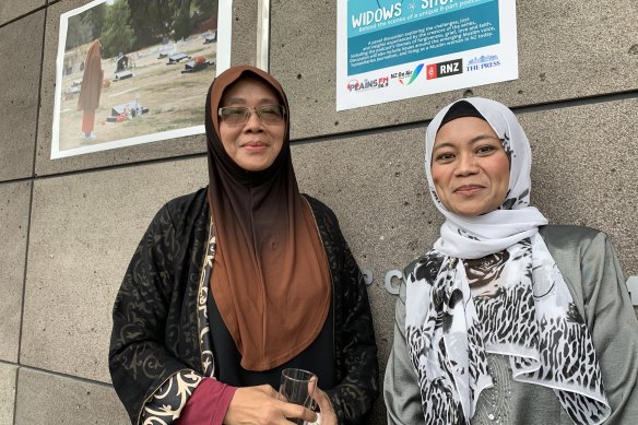Friends Jumayah Jones, of Al Noor mosque, and Hamimah Tuyan, who was widowed in last year’s terrorist attack, reunite at Christchurch Art Gallery one year after the shootings in Christchurch.