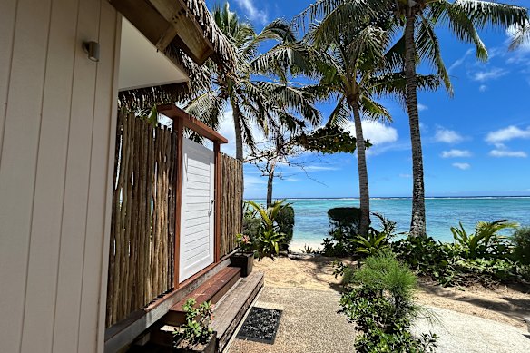 A stone pathway leads to your beachside villa with private deck.