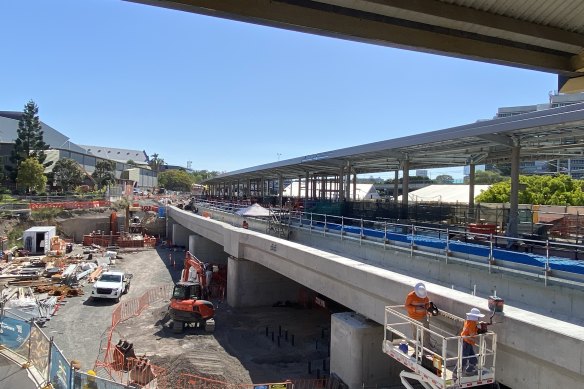 Thew new Exhibition rail station at Bowen Hills will be used by 10,000 commuters each day by 2036, the Cross River Rail Delivery Authority says. Roma Street station is to the left.