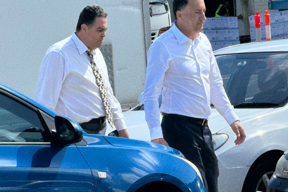 Joe Tripodi (left) arrived at Sydney Fish Market for lunch on Thursday with his lawyer Bassam Kazi after appearing in court on corruption charges.