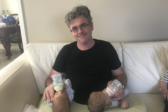 Jams Massola feeding his new born twins in 2018