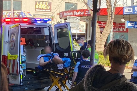 Emergency services respond to two men injured in a shooting on Marrickville Road in Sydney’s inner west on Friday. 