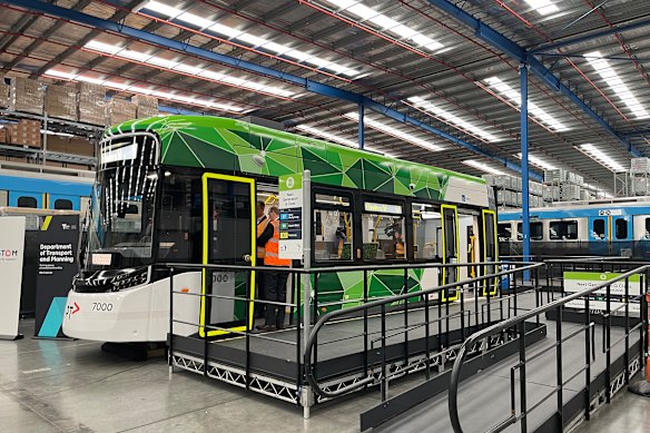 An elevated platform and a model of a G-class tram at a Melbourne depot.