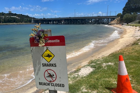 Flowers left by locals mourning Stella after the shark attack.