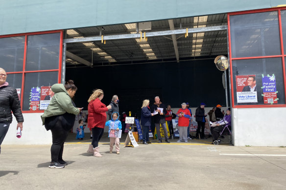 Melton voters at an early voting centre housed in a disused Bunnings Warehouse on Tuesday.