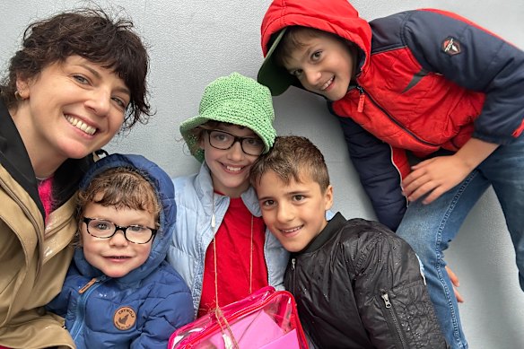 Caroline Massola with her three-year-old daughter, Mattea, and Mattea’s cousins Sabina, Giacomo and Carlo in the James Turrell sculpture at the National Gallery of Australia. 