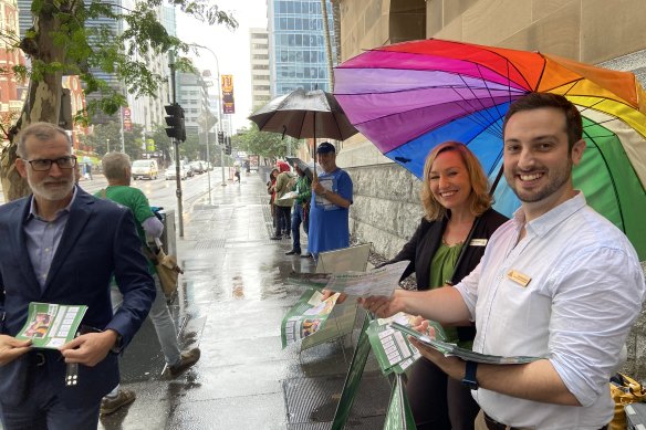 Greens Senator Larissa Waters with Brisbane candidate Stephen Bates during pre-poll voting at Brisbane City Hall last week.