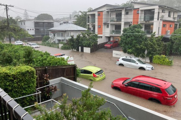 Submerged cars caught by Brisbane flash floods on Sunday. 