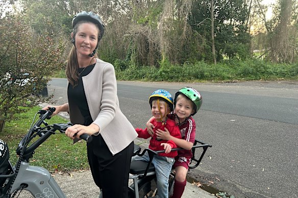 The author and her children on their e-bike.