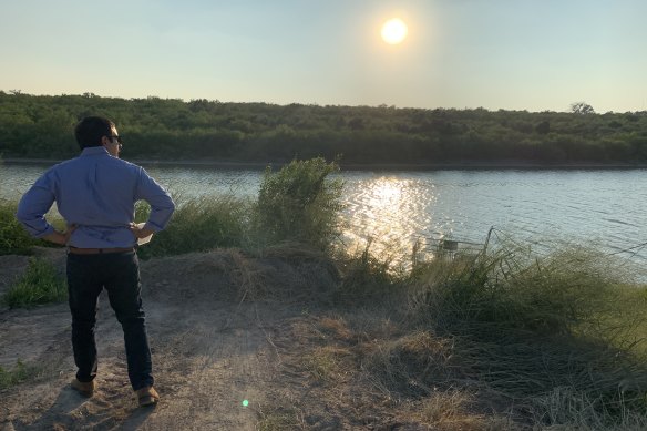 Laredo resident and lawyer Carlos Flores  overlooking the Rio Grande river.
