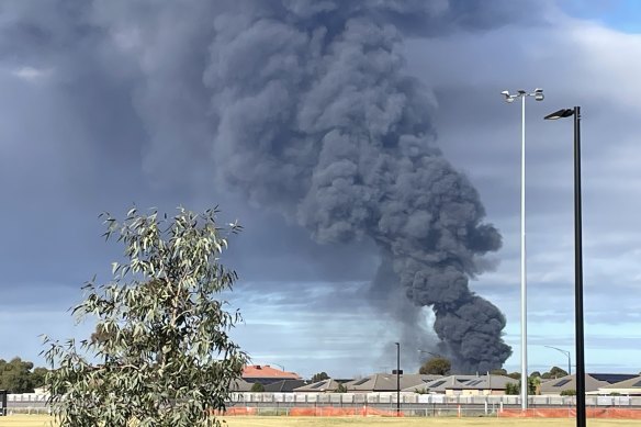 Plumes of smoke from the Derrimut fire on Wednesday, as seen from Bon Thomas Reserve, Deer Park.