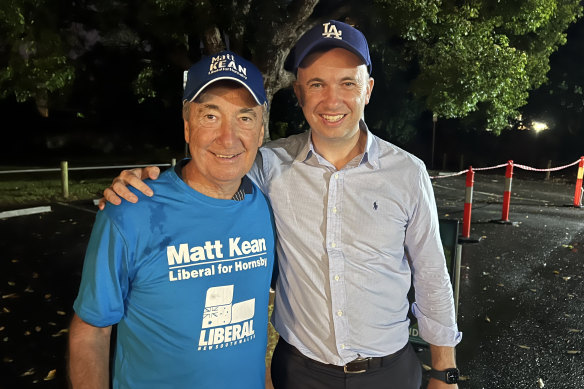 Kean campaigning with his father,
Noel, who had cried upon hearing that his son had been made NSW energy and environment minister.