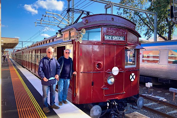 Restoration volunteers  Kevin (left) and Tom Clark beside a red rattler.