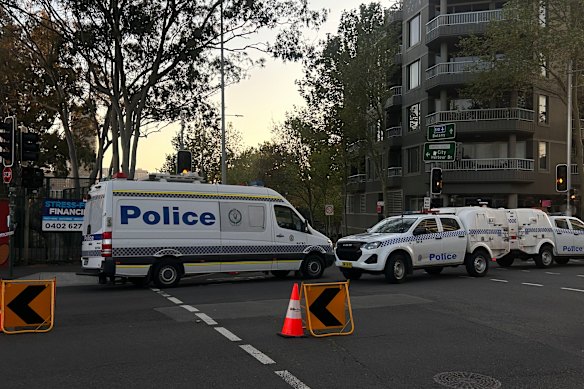 Police at the scene in Redfern where a NSW Police officer died after the fully marked vehicle she was a passenger in crashed into a tree. A male constable driving the car has been hospitalised.