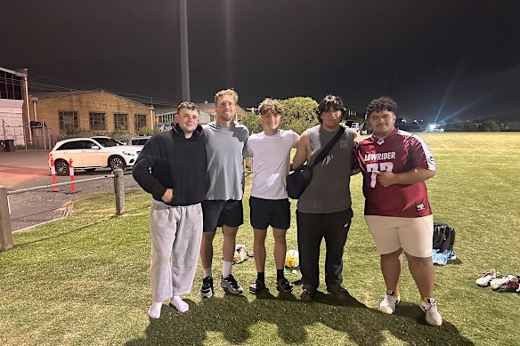 Wallaby Harry Potter (second from left) with members of the Moorabbin Rugby Club team  in April.