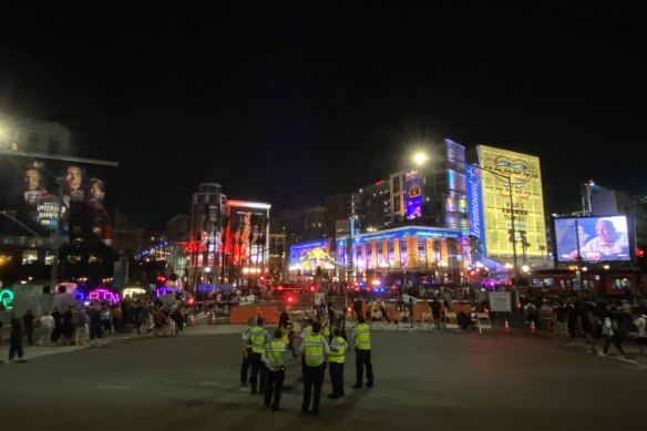 San Diego police officers on duty as night one of this year’s Comic-Con gets underway.